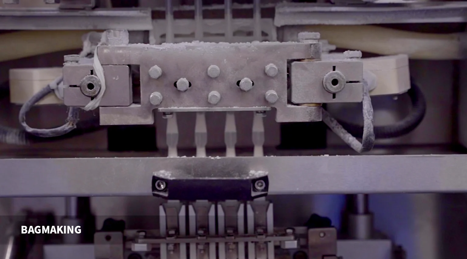 Pouch making in supplied process material